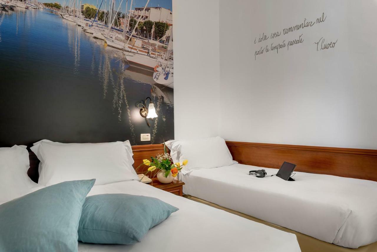 Triple Room Balcony Beach